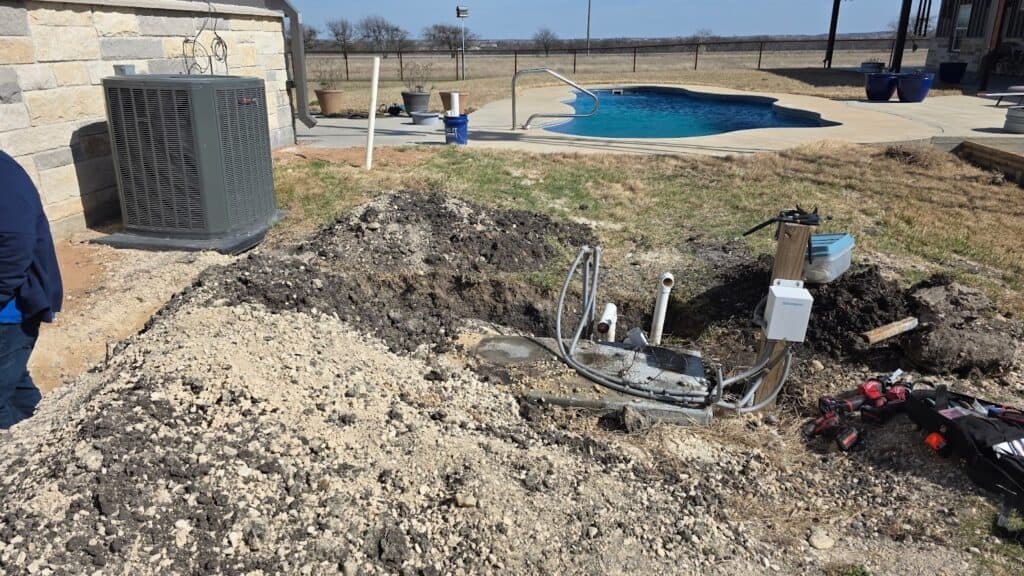 Pool equipment excavation during repair work caused by neglected pool maintenance in Central Texas.